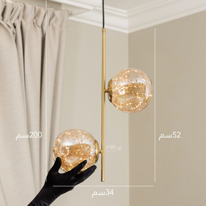 Two Golden Pendant Lighting Balls with LED Lighting spots